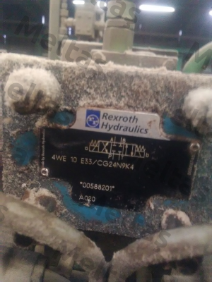 4WE 10 E33/CG24N9K4 Rexroth